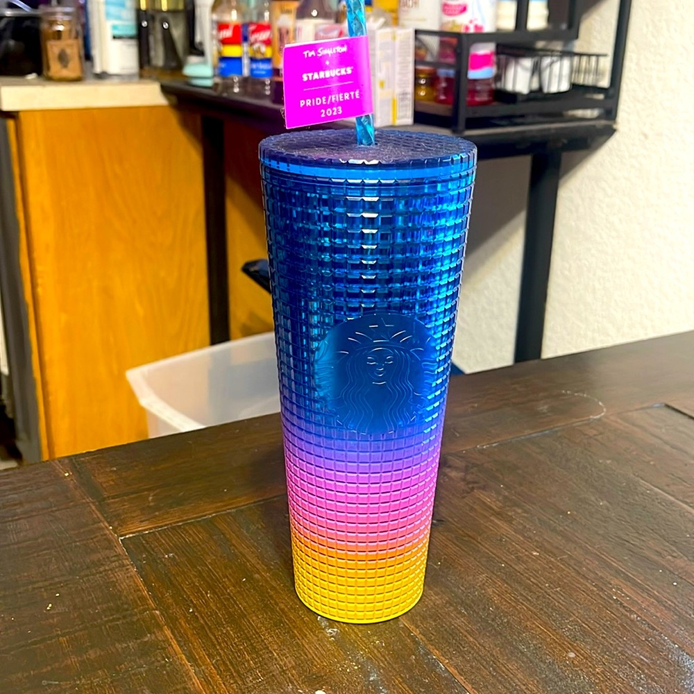 Starbucks tumbler + Tim Singleton
